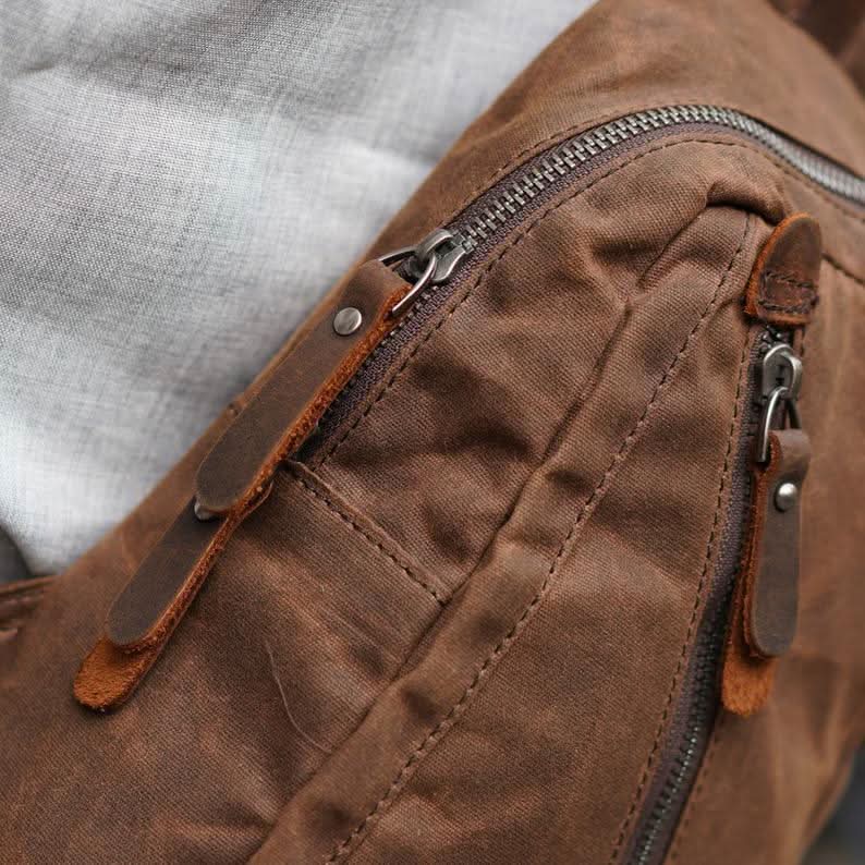 Sling Backpack Canvas Vegan Leather Trim Multiple Compartments